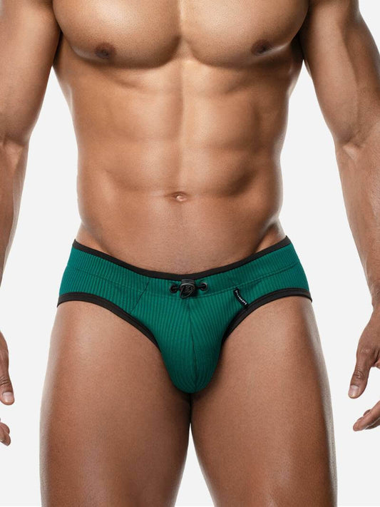 Teal men's underwear with black trim on a white background