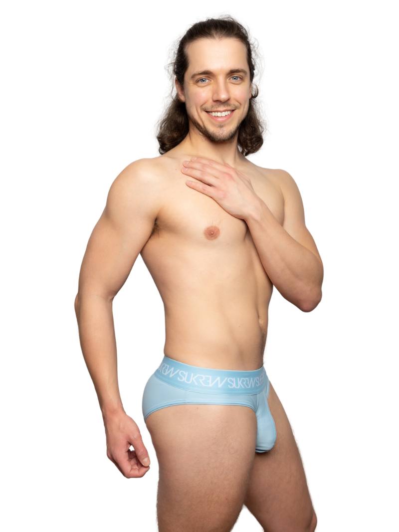 Man wearing a light blue underwear on a white background