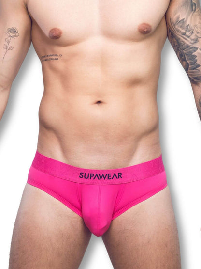 Person wearing bright pink underwear with 'Supawear' branding on a white background