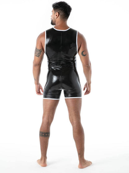 Man wearing a black vinyl outfit on a white background