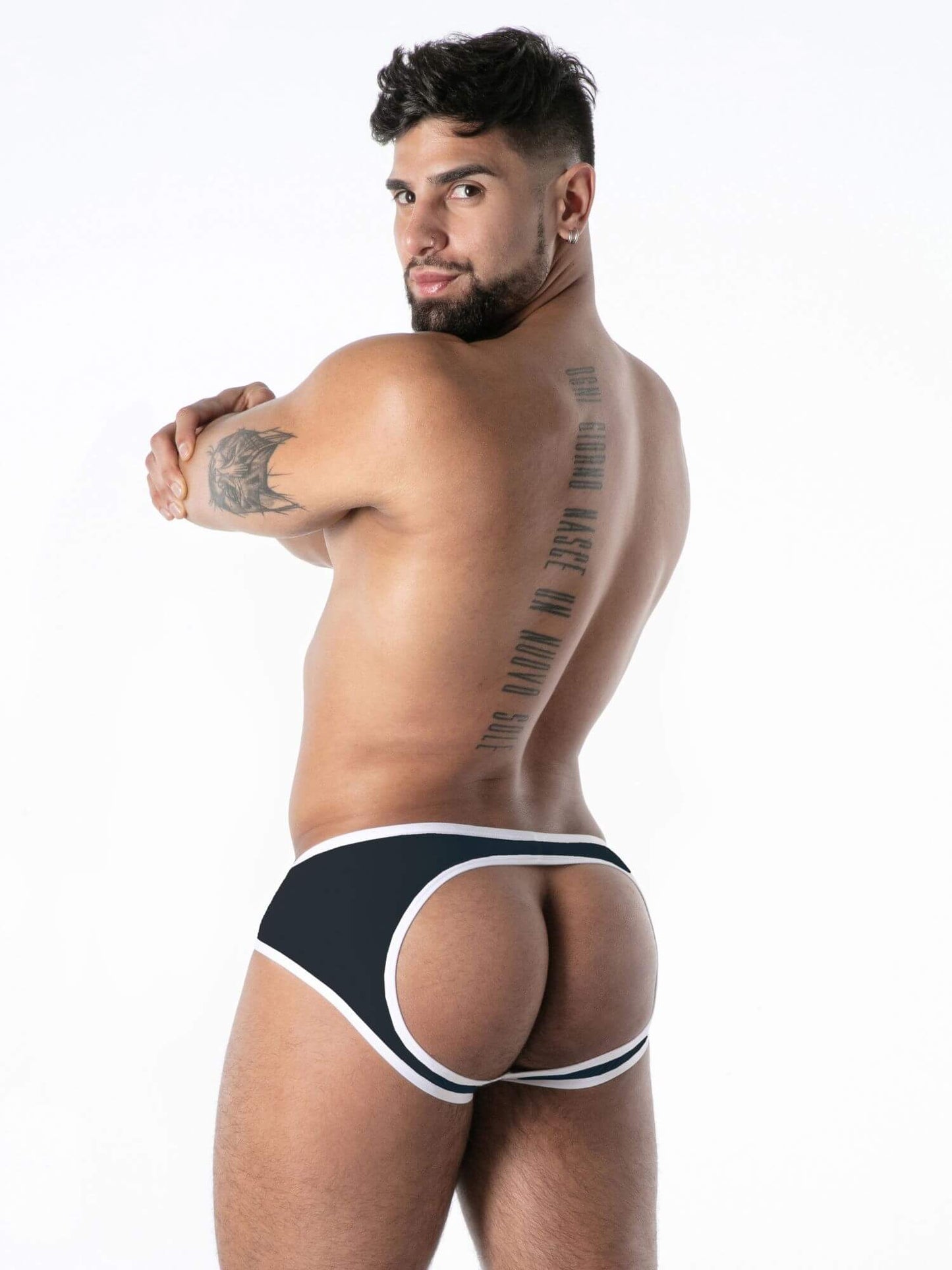 Man wearing a black and white men's underwear on a white background