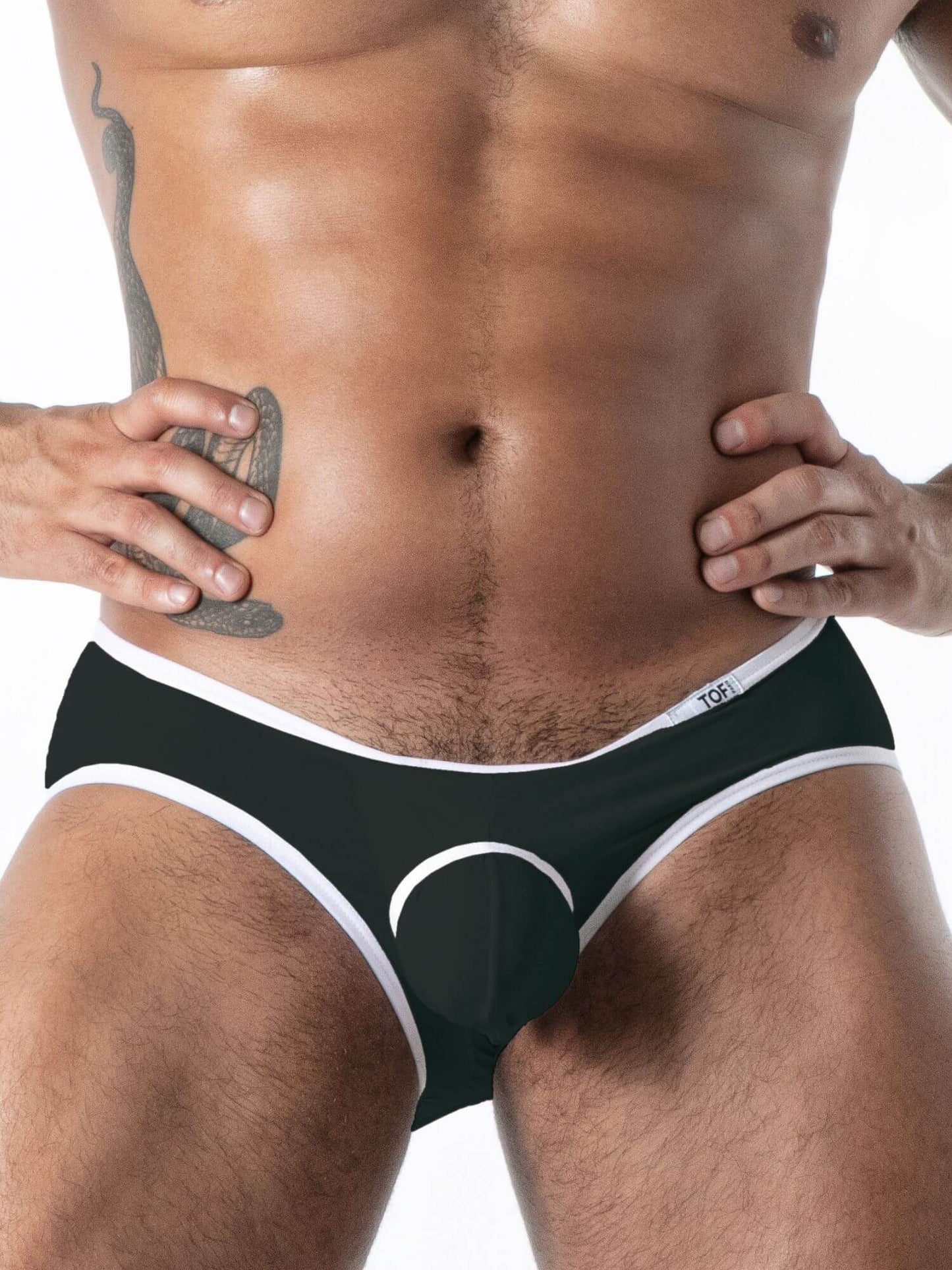Man wearing a black and white underwear with a visible brand logo on a white background