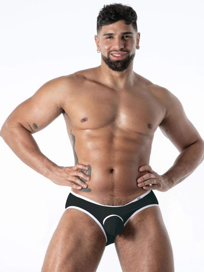 Man wearing black underwear on a white background