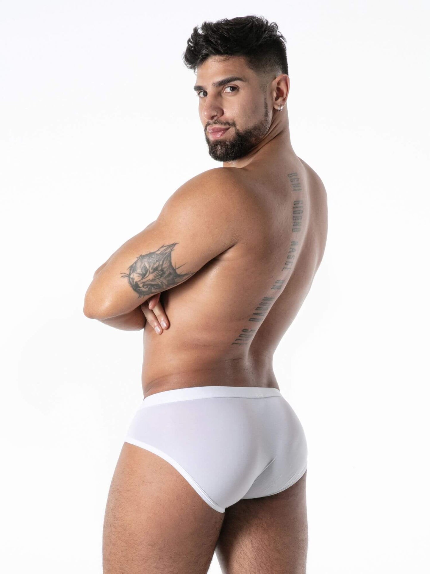 Man wearing a white underwear on a white background