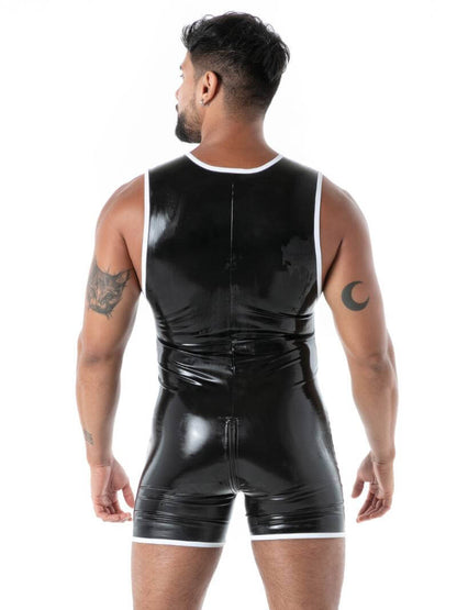 Person wearing a black latex outfit on a white background
