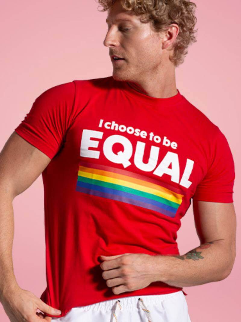A red cotton t-shirt with 'I choose to be Equal' text and a rainbow flag on the chest, and the aussieBum branding on the back.