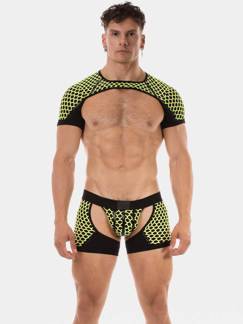 Man wearing black and yellow mesh athletic outfit on a white background
