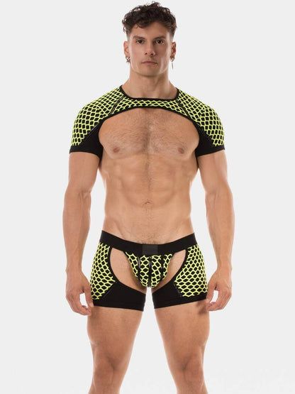 Man wearing black and yellow mesh athletic outfit on a white background