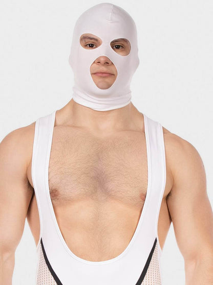 Person wearing a white balaclava and mesh tank top on a plain background