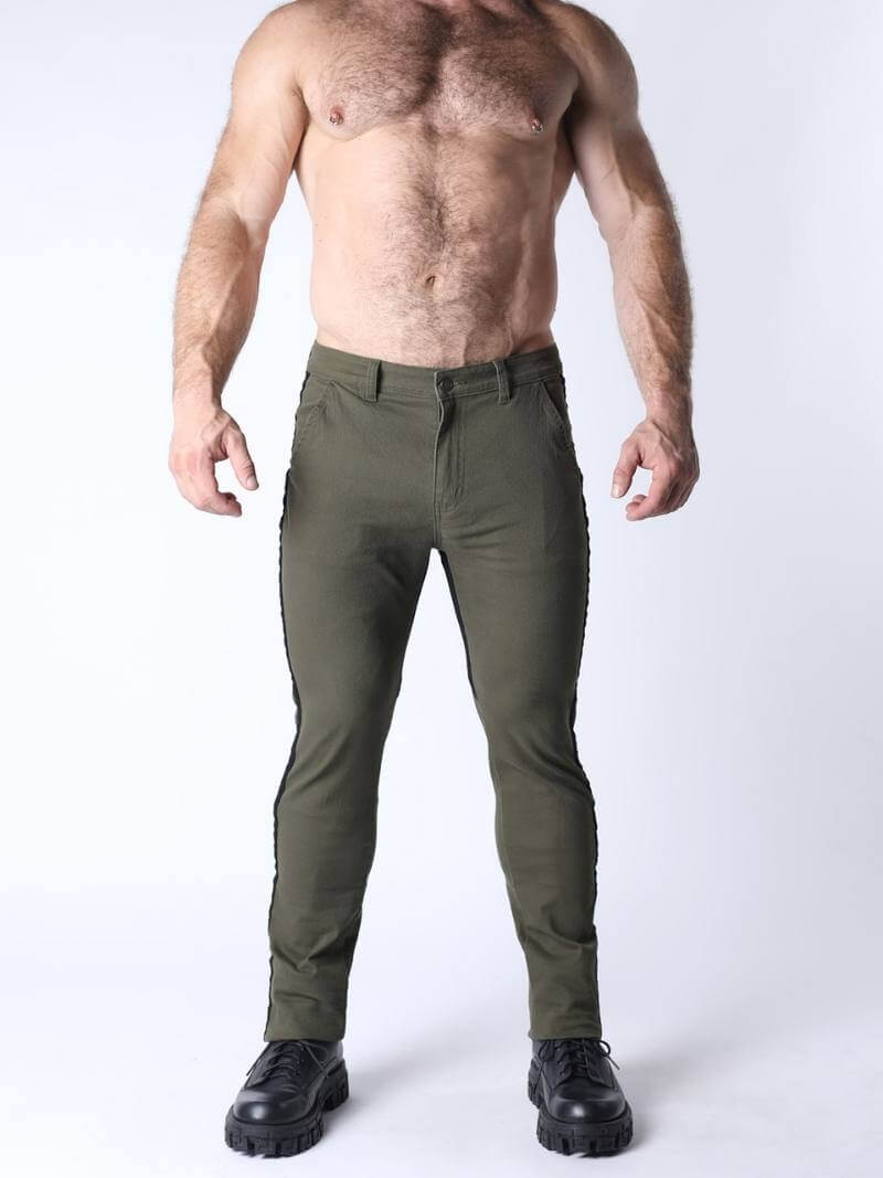 Man wearing olive green pants on a white background