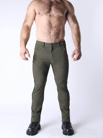 Man wearing olive green pants on a white background