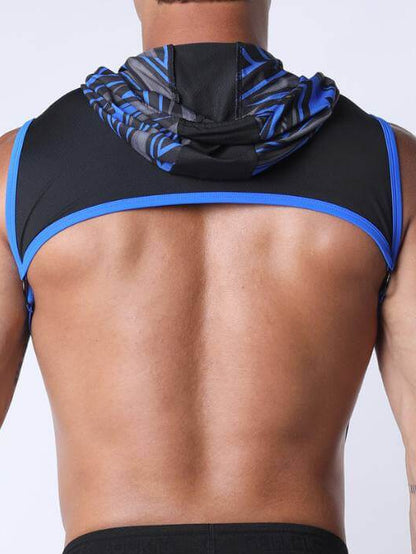 Man wearing a black and blue athletic outfit on a white background