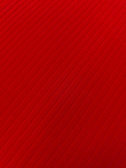 Solid red color swatch with a subtle pattern
