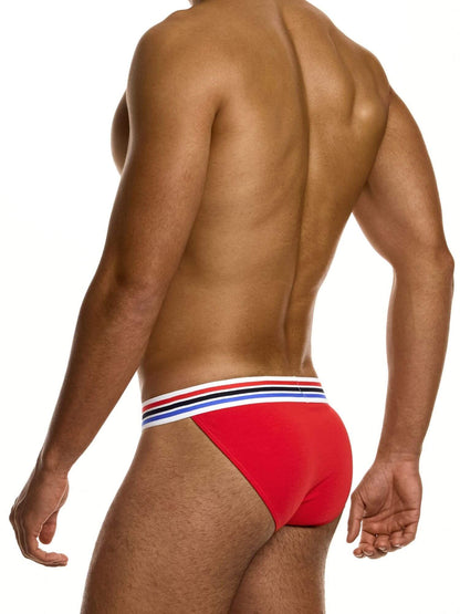 Red tanga brief with black, blue and white stripes on a white background
