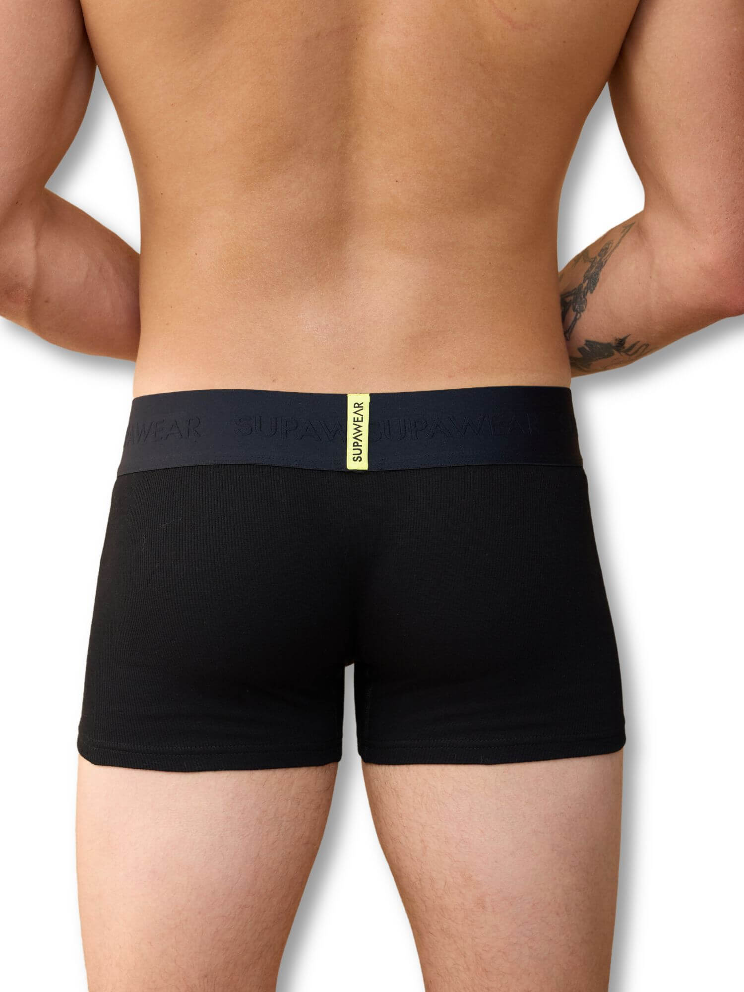 Black boxer briefs with a brand label on a white background